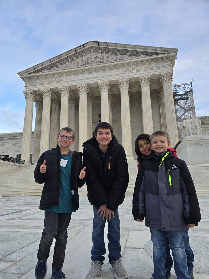 The four kids in front of the Supreme Court