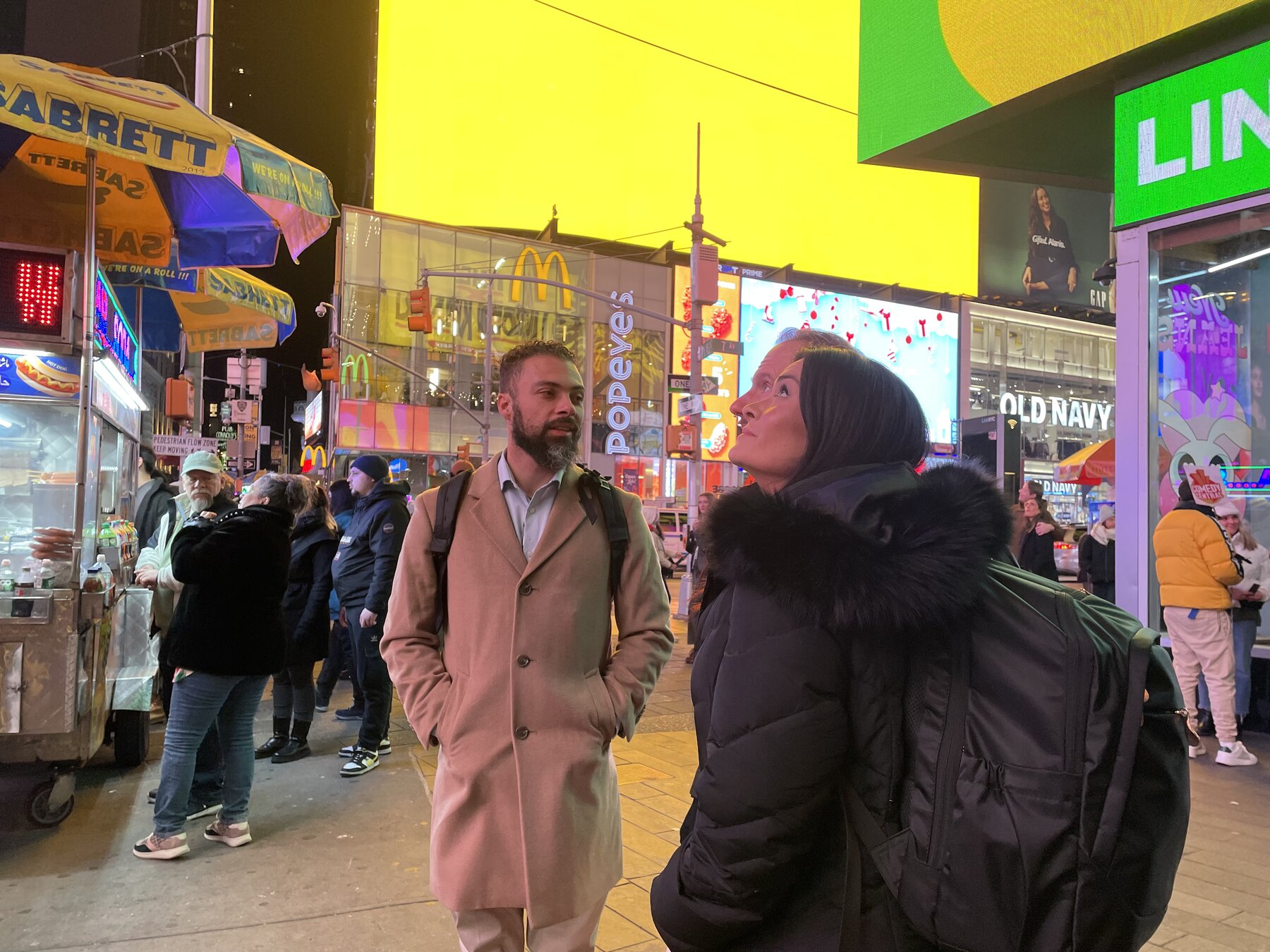 Two retreat participants taking in Times Square at night