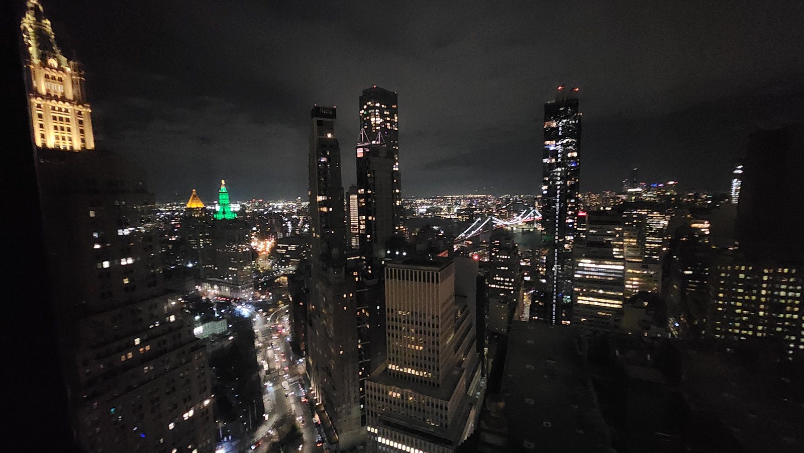 Night view of the city from a hotel room window